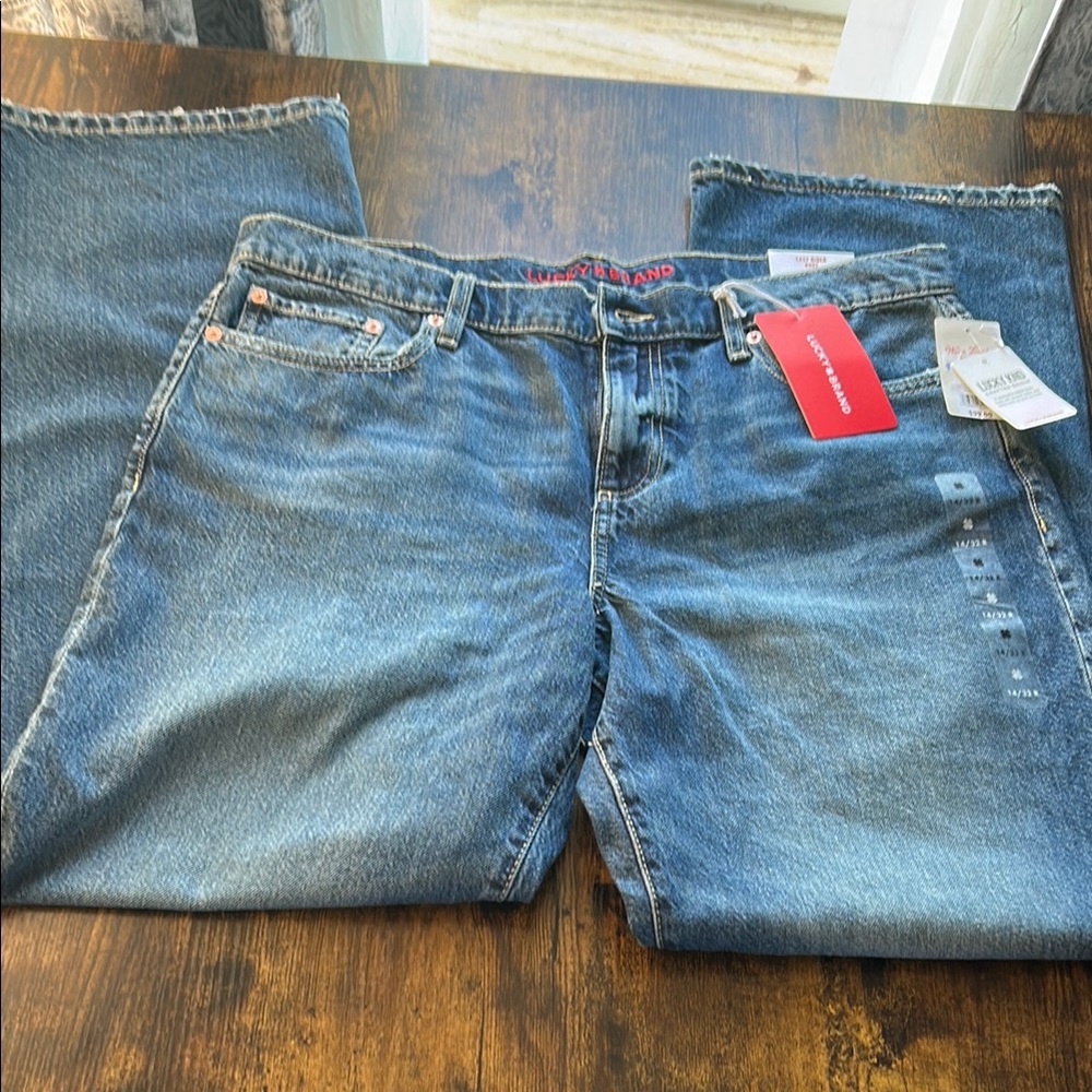 Lucky Brand Blue Boot Cut Jeans with Classic Distressed Look